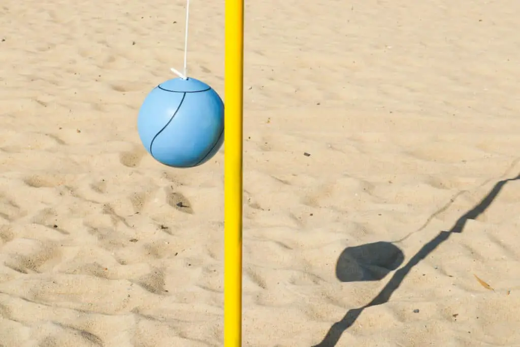 Yellow tetherball pole with ball